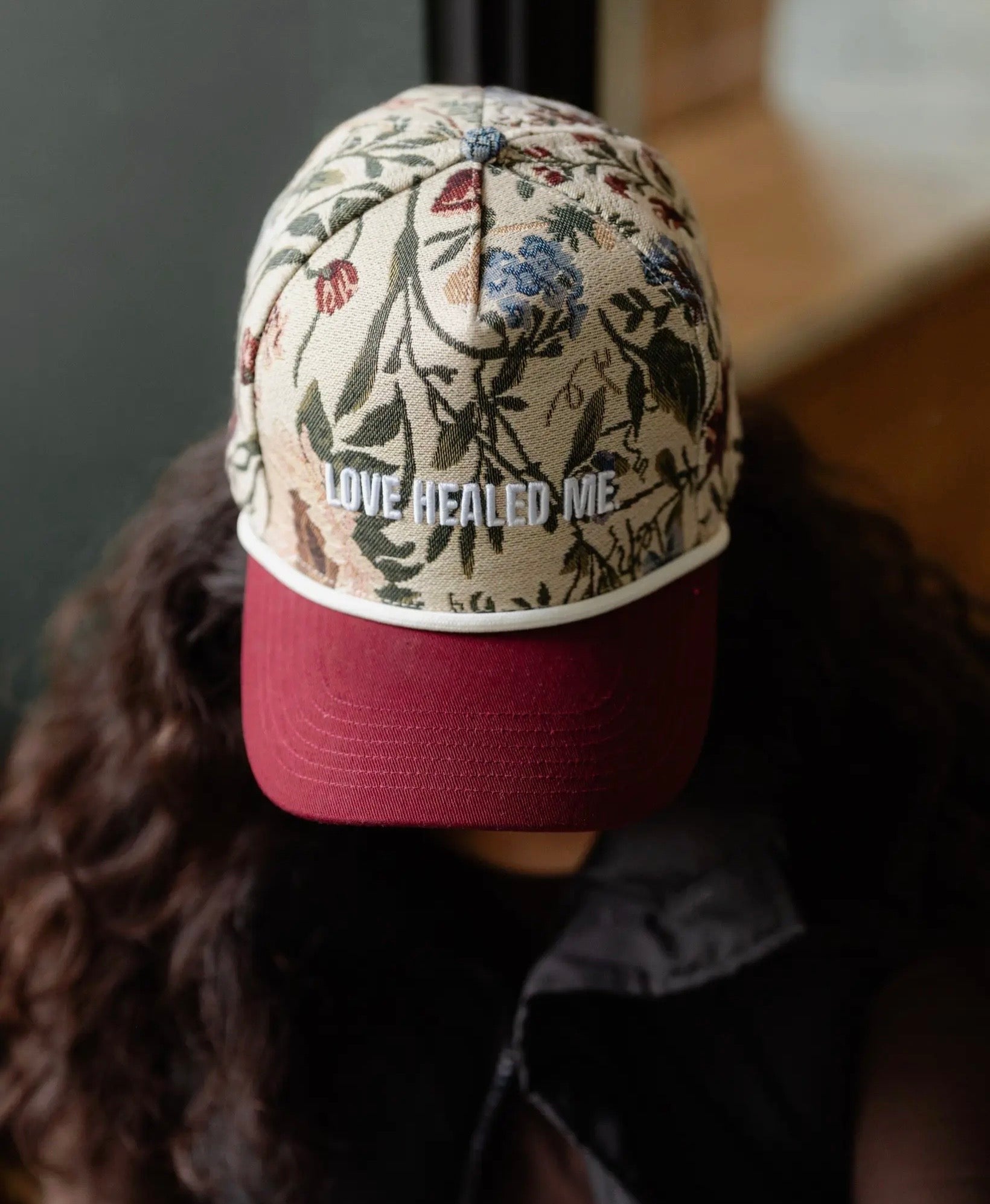 love healed me trucker hat